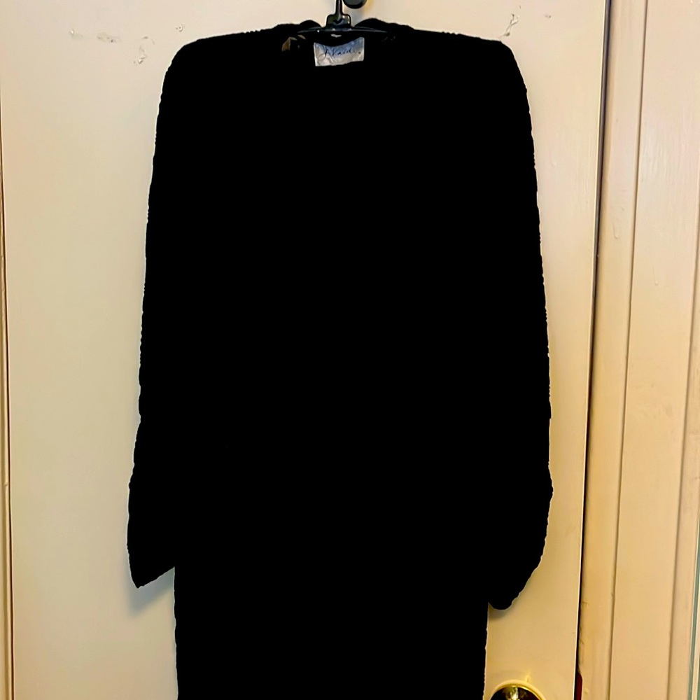 Adorable black top, can be used for a dress or bathing suit cover-up